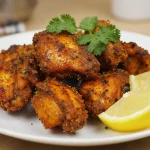Savoureux poulet tandoori cuit à la perfection dans un airfryer, offrant des saveurs épicées et une texture juteuse.